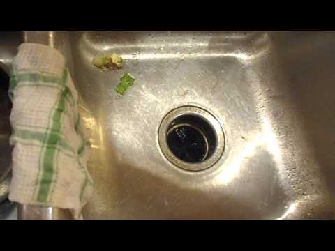 how to empty a sink disposal