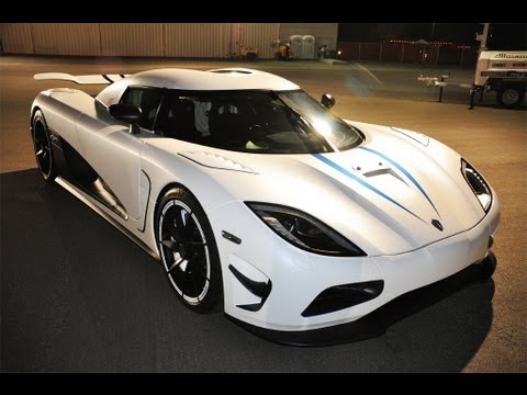 AGERA - BrianZuk records the first Koenigsegg Agera R in the United States! The video shows the exterior of this stunning Agera R, then a start up and the R driving ...