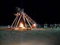 Flaming Piano tossed by Trebuchet