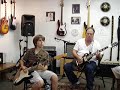 10 year old guitar slinger and Teacher play Blues