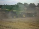New Holland L626 and John Deere 2264 in action New Holland L626 and John Deere 2264 in action