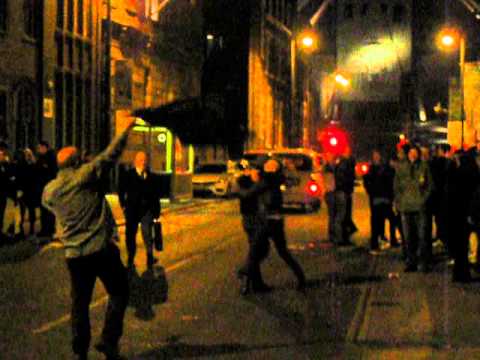 celebrates - Liverpool reacts to news of Thatcher's death. Dancing and chants outside the old miner's bar on Hope Street.