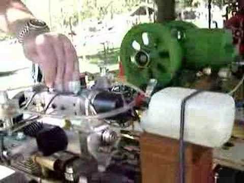 Flat four Engine - This horizontally opposing flat four cylinder model was make from scratch - using solid billets of materials: aluminum, brass, etc. Cast iron piston rings ta...