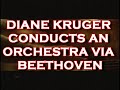 diane kruger conducts an orchestra