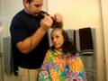 29-year-old woman with breast cancer shaves her head.