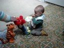 Ben dances with Elmo