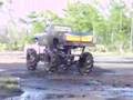 BAD ASS BIG TRUCKS IN THE MUD. MUDDING. ((( PART 1 OF 2 )))