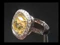 3.36 Intense Yellow Cushion Diamond in Ring