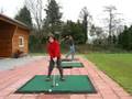 Sanne op de drivingrange