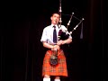 andrew playing a bagpipe solo