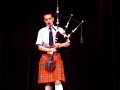 Andrew playing a bagpipe solo