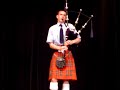 andrew playing a bagpipe solo