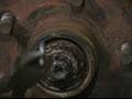 How to Repack Grease & Adjust Wheel Bearing in Cars : How to Remove Cotter Pins on Cars