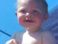 Alfie at the beach in his lettle tent