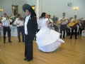 Shule and Ariel dancing el Jarabe Tapatio at their wedding reception.