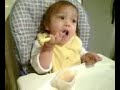 Baby feeding herself