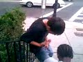 white kid actin stupid around a group of black people