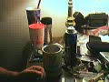 Rolling a cigarette.