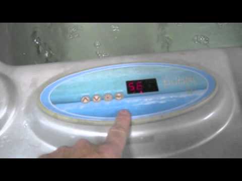 how to drain artesian hot tub