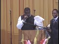Elder Dominique Watkins preaching in AIM 2007 Youth Church
