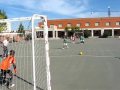 Los benjamines calentando antes del partido