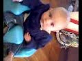 Alon sits up