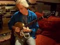 Steve Postell with \"Helmet Guitar\" Steve Postell with \"Helmet Guitar\"