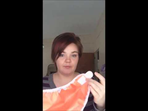 how to fasten cloth diapers