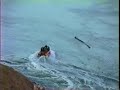 Swimmers ride the currents through tide rips and whirlpools at Deception Pass, Washington