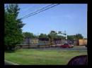 csx 410-21 with two locomotives and over 100 cars takes over 4 minutes to clear the sunnyside road grade crossing in beltsville. i bet the red car backing up a the start wished they had kept on going!
