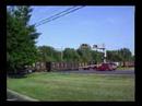 csx 410-21 with two locomotives and over 100 cars takes over 4 minutes to clear the sunnyside road grade crossing in beltsville. i bet the red car backing up a the start wished they had kept on going!