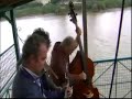 bargain basement perform the first of the river songs on the transbordeur in rochefort - one single river was first recorded by ian and sylvia but also features on the basement tapes and that's what counts. bb are vic moan, brad scott and silvain vanot. the music was good the weather rather bad.
the river by the way is the charente.