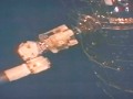 JAXA's HTV-1 spacecraft grappled by Robotic arm operator,Nicole Stott