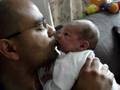 Baby Seth kisses Daddy
