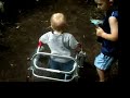 Owen walking at Zoo with kaye walker (spina bifida)