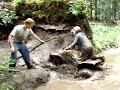 800 Renegade in the water and mud pit