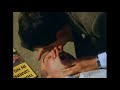 OFFICIAL MR BEAN. Mr Bean is first on scene when a man has a heart attack at the bus stop. He manages to revive him with a set of jump leads. From Mr Bean Rides Again.