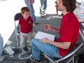 here is a video of me drawing a young boy at a festival.