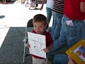 here is a video of me drawing a young boy at a festival.