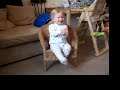 Ben clapping in chair