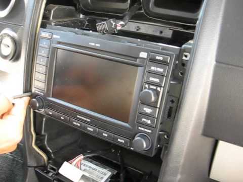 How to Remove Radio / Navigation / CD Changer from Dodge Charger 2006 for Repair.