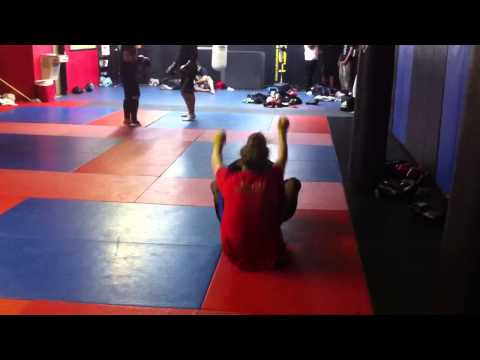 SSF Submission Academy - Pro MMA fighter Nate Landwehr with All Army Boxer Jamild Jones working abs at SSF Submission Academy.