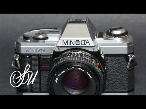 how to open a minolta x-370 camera