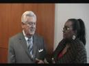 jarilyn fox with business news group and women's enterprise online interviews tom trotter, a diversity pioneer, at wbcs's business works in arlington, tx.