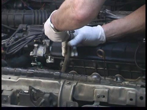 How to Replace a Car Radiator : Disconnecting Transmission Lines  to Replace Car Radiator
