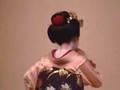Two maiko dancing in a Gion  theatre