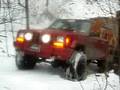 jeep xj on snowy hill