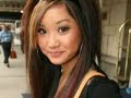 brenda song posing for paparazzi ny city.a fresh faced brenda song is seen out side the hilton hotel in new york city 1/9/07.