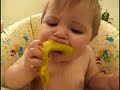 Baby eating mango Baby eating mango