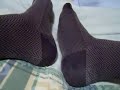 Patterned socks after a hard day at the office Patterned socks after a hard day at the office